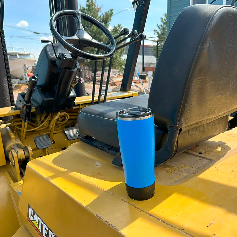 Crater Lake Blue TwistLock insulated 22oz Tumbler locked  to a mini disc attachable cup holder on an heavy duty forklift.