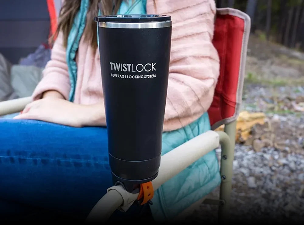 Locking cup holder attached to the arm rest of a camp chair.