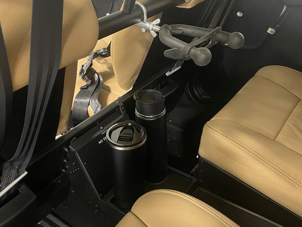 TwistLock Canteen and Tumbler attached to mini disc locking cup holders in the backseat of an helicopter.