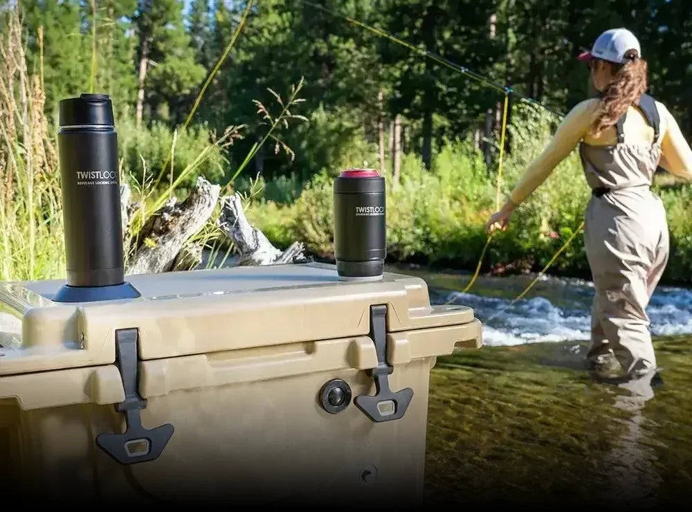 TwistLock Mini Disc Locking Cup Holder  and Flat Mount attached to the top of a cooler with woman fishing in the background.