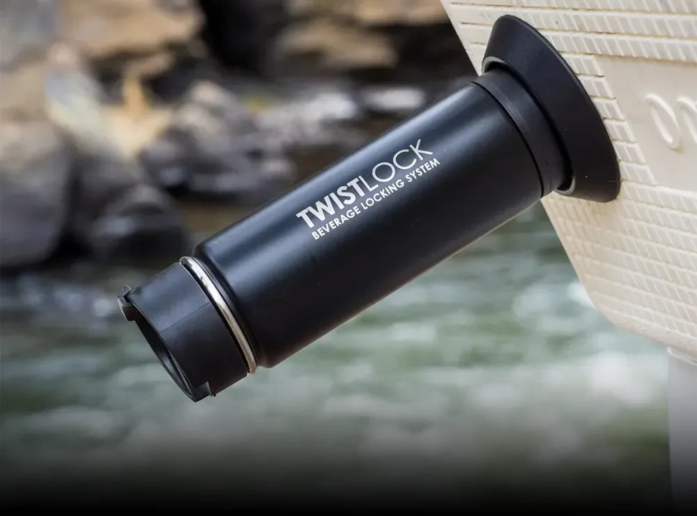 TwistLock Flat Mount secure locking cup holder attached to a cooler lid by a river.