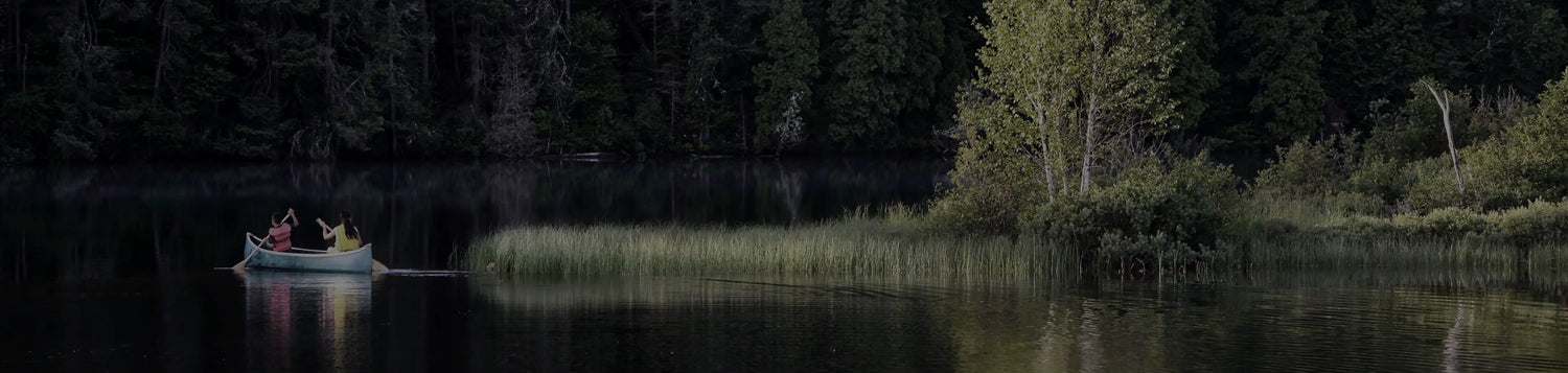 Canoeing in a forest lake Hero for best selling insulated drinkware and locking base cup holders for desktop.