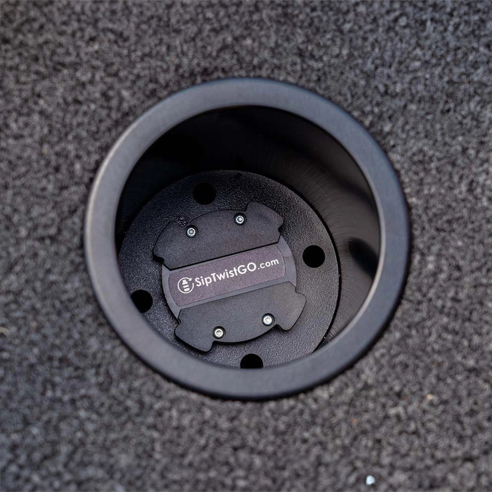 Top view of a drop in Recessed Cup Holder with TwistLock Technology in a boat floor.