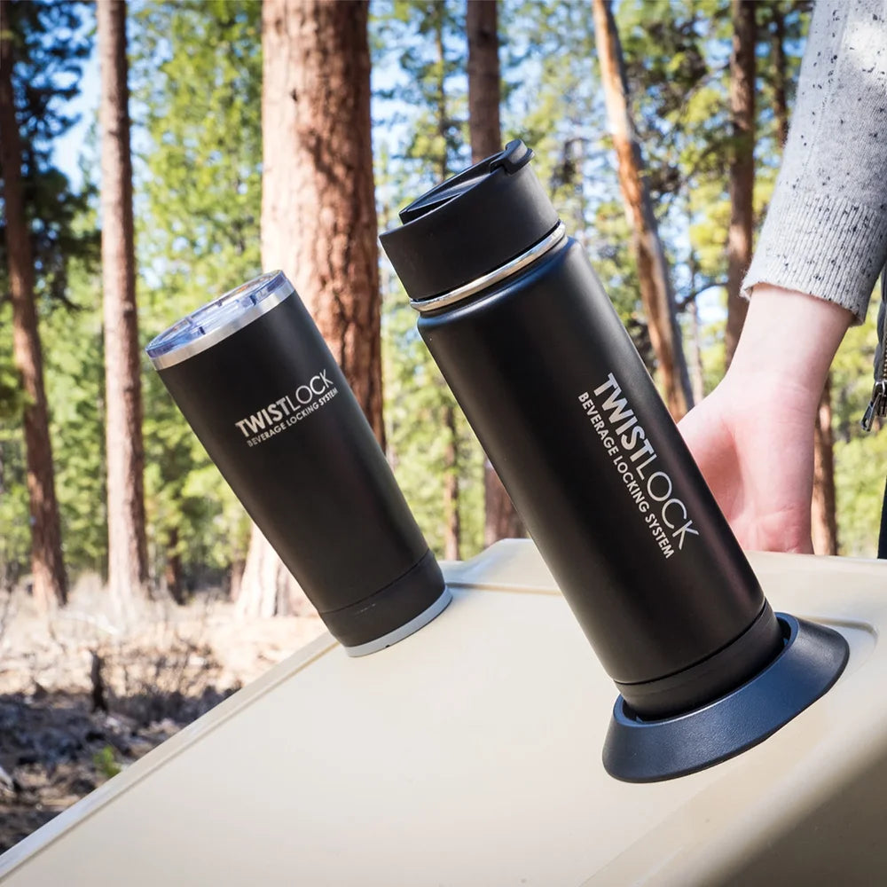 insulated tumbler and canteen attached to the lid of an opening cooler using TwistLock locking cup holders.