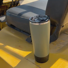 Showing a Trailhead Green TwistLock tumbler being locked into and out of a mini disc locking cup holder on a forklift.