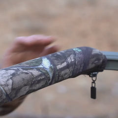 A hunter installing the bar mount attachable locking cup holder to his tree stand and securing his TwistLock Canteen.