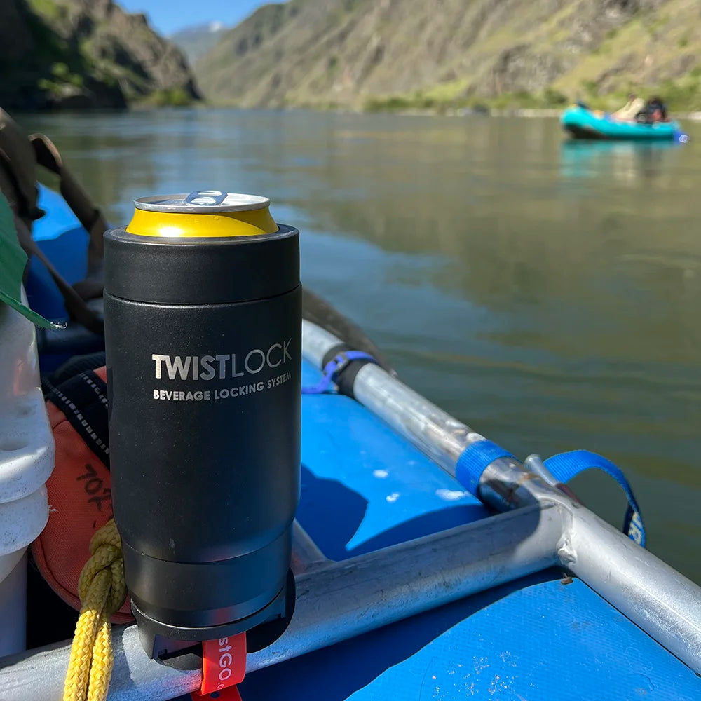 Whitewater raft frame with locking cup holder attached to it and a insulated can cooler secured in.