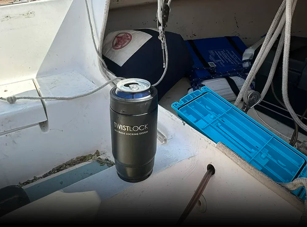 TwistLock Mini Disc Locking Cup Holder attached to a sailboat with a 12oz insulated stainless steel can cooler.