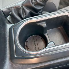 Locking cup holder in a car to make a spill proof setup.