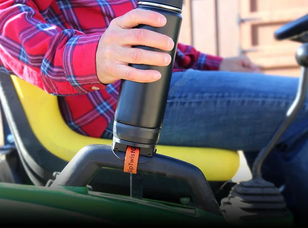 Tractor grab handle locking cup holder.